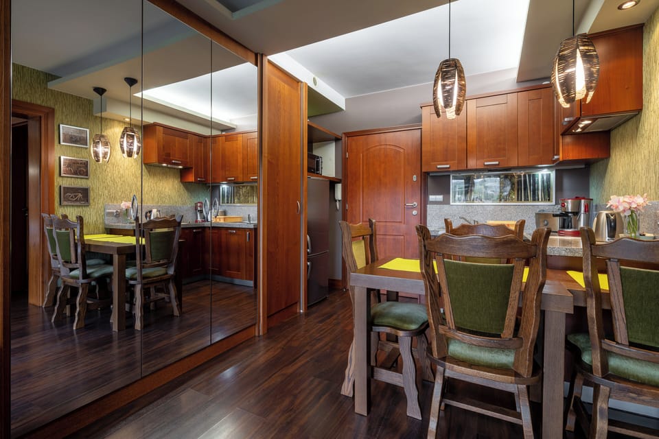 Apartment, Balcony, Mountain View | Living area | Flat-screen TV