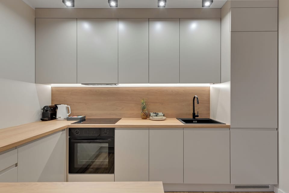 Deluxe Apartment, 2 Bedrooms, Terrace | Private kitchenette | Fridge, oven, stovetop, dishwasher