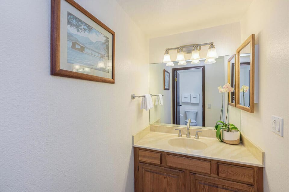 Get ready for the day at your own private vanity, complete with ample lighting and storage.