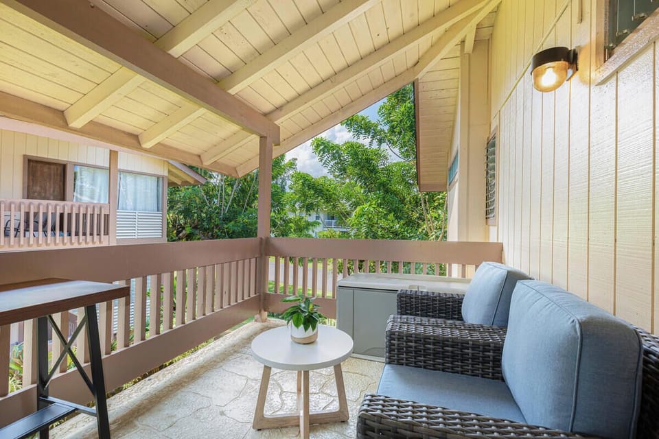 Sip your morning coffee or relax with a book on the private lanai, surrounded by lush garden views.