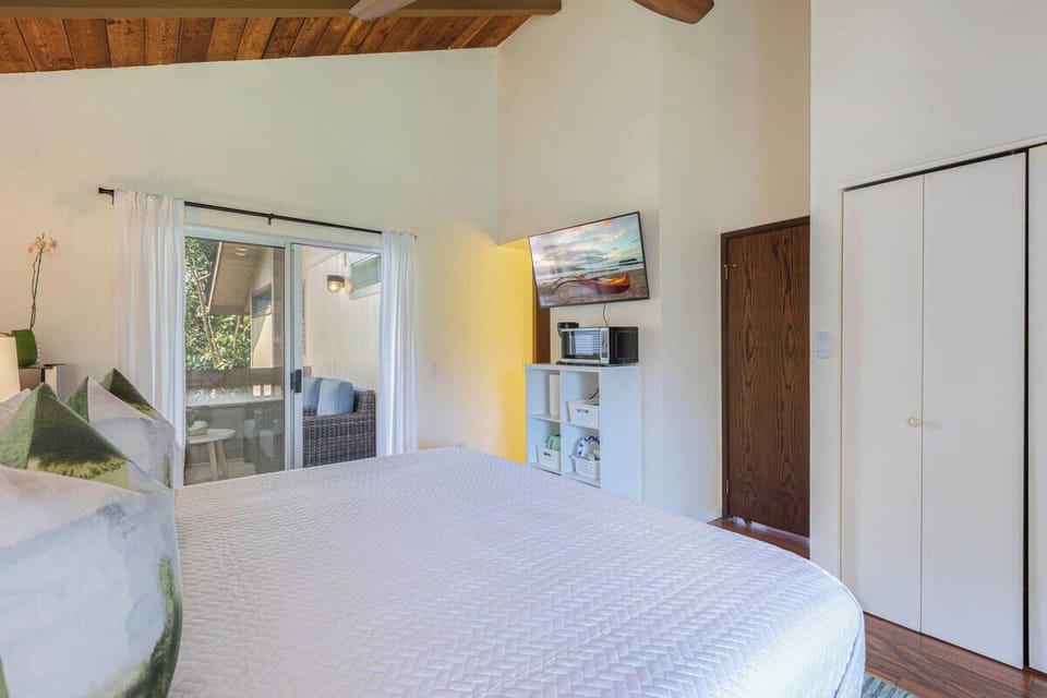 Spacious and stylish, the king bed invites restful nights after your island adventures.
