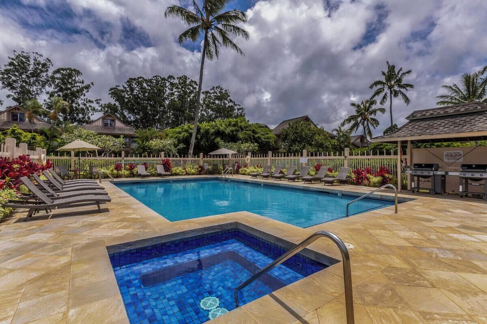Unwind by the Sandpiper Village pool and hot tub—your tropical escape just steps from your door.