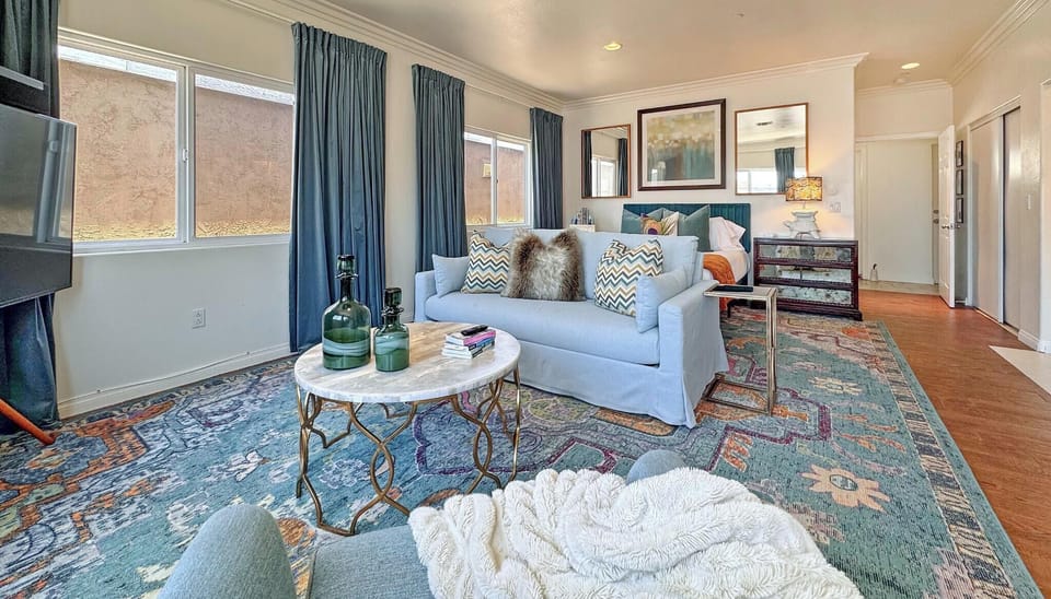 Bright, stylish suite with queen sleeper sofa for extra guests