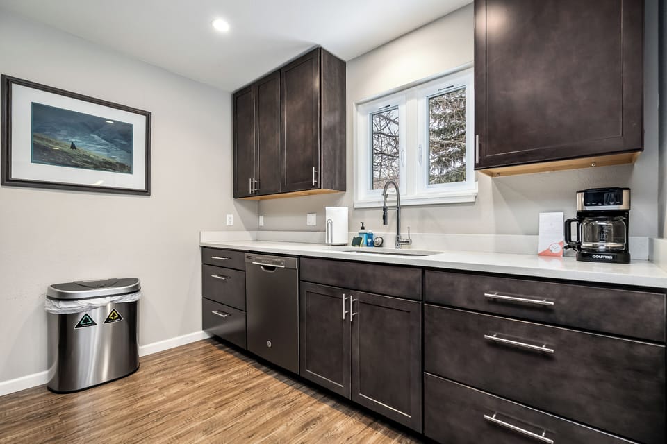 Beautiful dark cabinets and light countertops go along with a slow morning. 