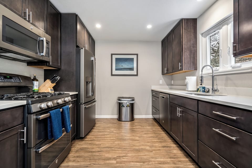 This full kitchen is the perfect place to make your coffee in the morning. 