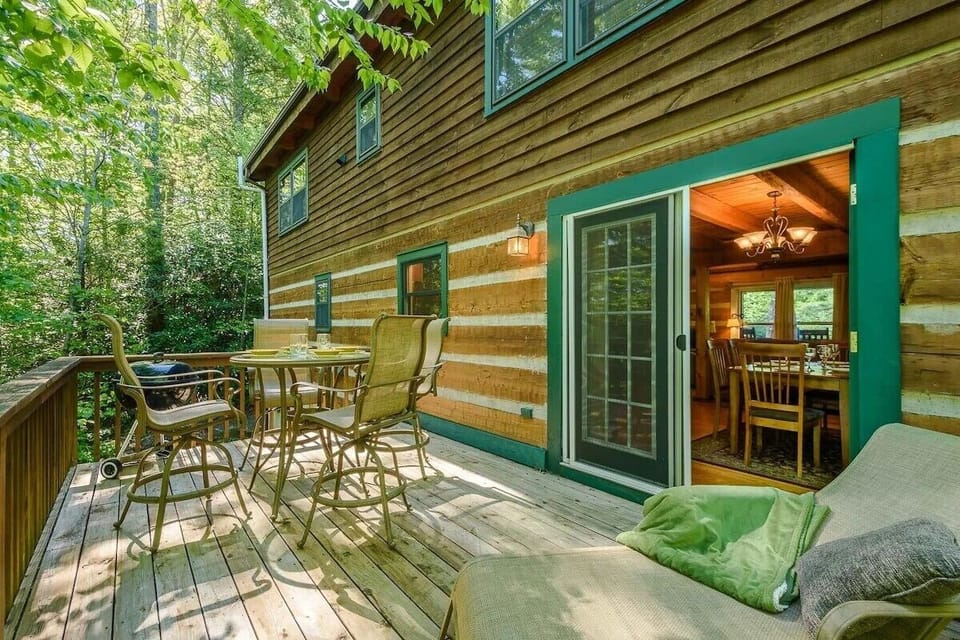 Grandfather Vista back deck with charcoal grill and seating.