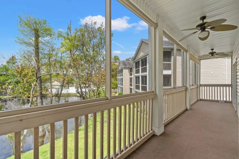 Relax on the balcony while enjoying the pond view.