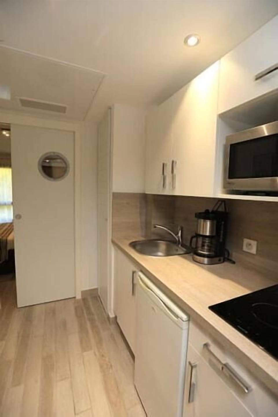 Mini-fridge, microwave, stovetop, espresso maker