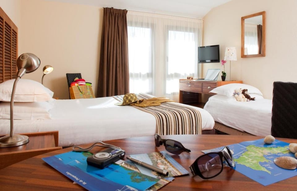 Blackout drapes, iron/ironing board, free cribs/infant beds, free WiFi