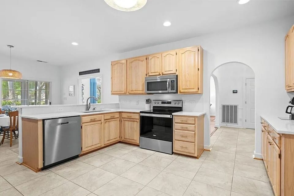 Fully equipped kitchen for home-cooked meals and cozy breakfasts together.