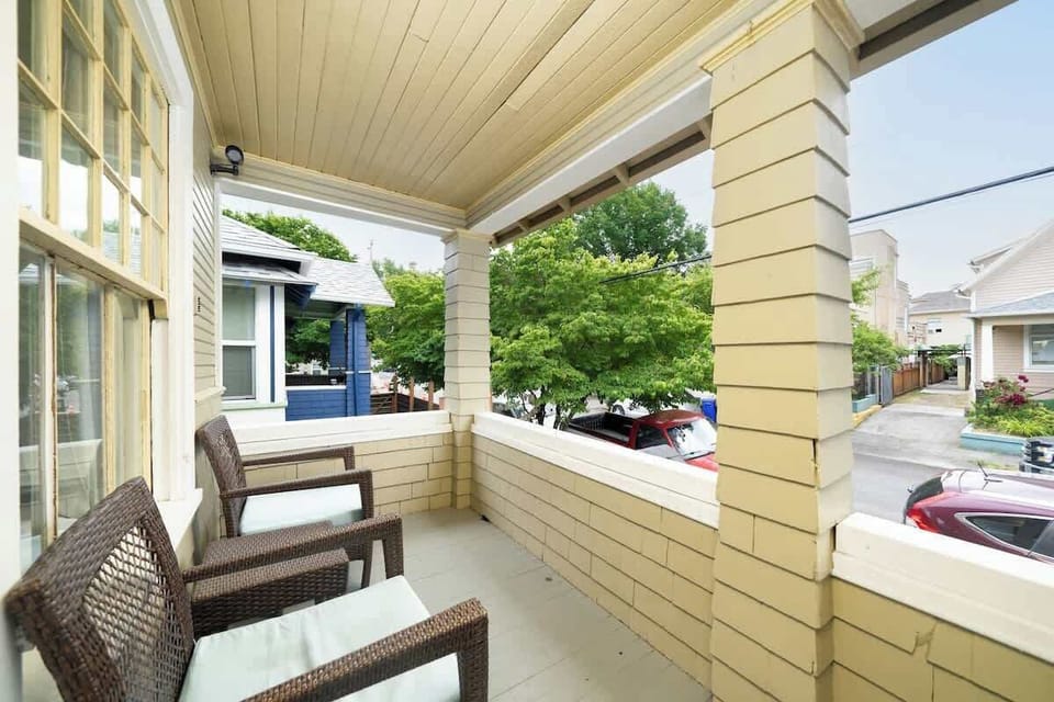 Covered porch with neighborhood view.