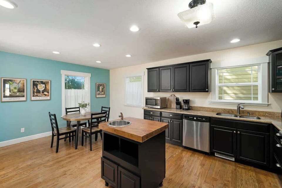 Kitchen with dining area and island.
