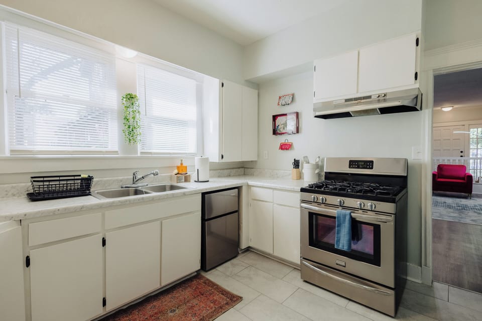 Full Kitchen with stainless steel appliances, including coffee, decaf coffee tea