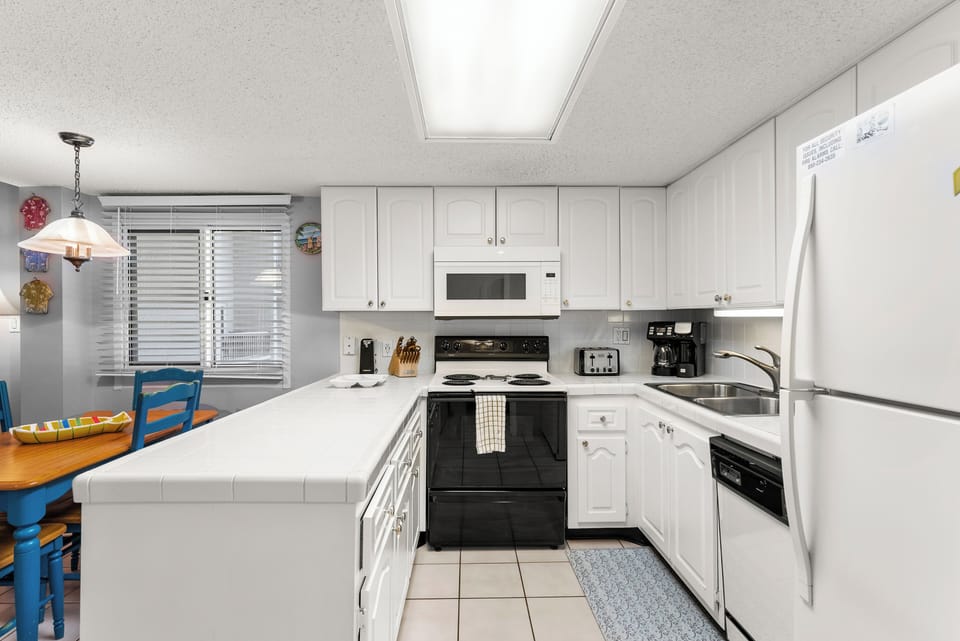 You have great workspace in the open-concept kitchen.
