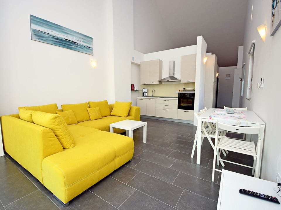 Furniture, Couch, Property, Comfort, Interior Design, Living Room, Studio Couch, Flooring, Floor, Wood