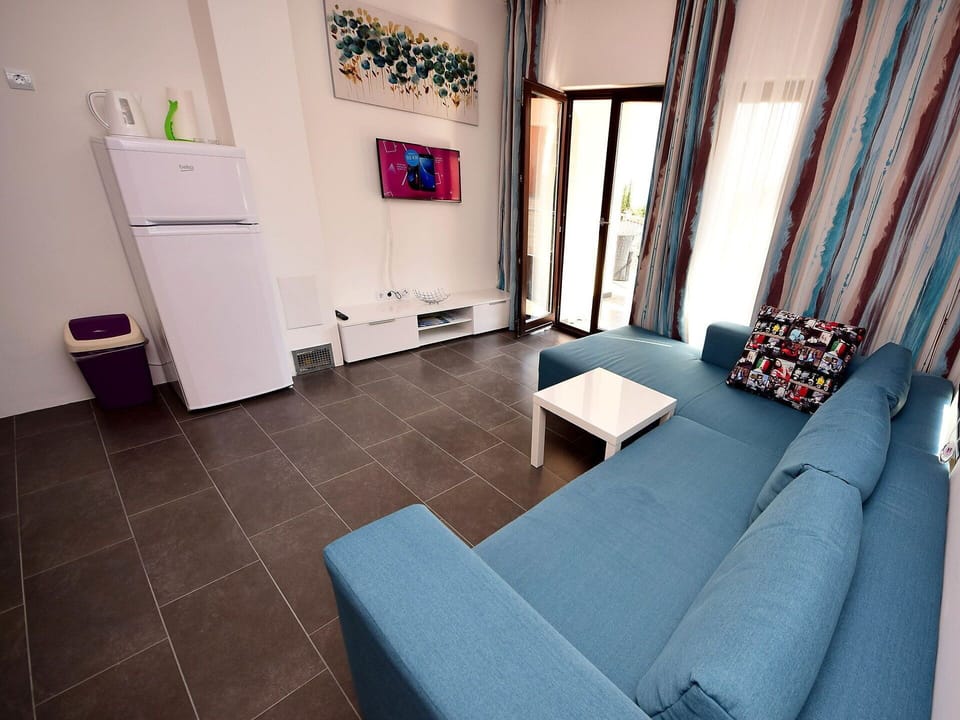 Furniture, Couch, Building, Interior Design, Comfort, Curtain, Door, Floor, Table, Flooring