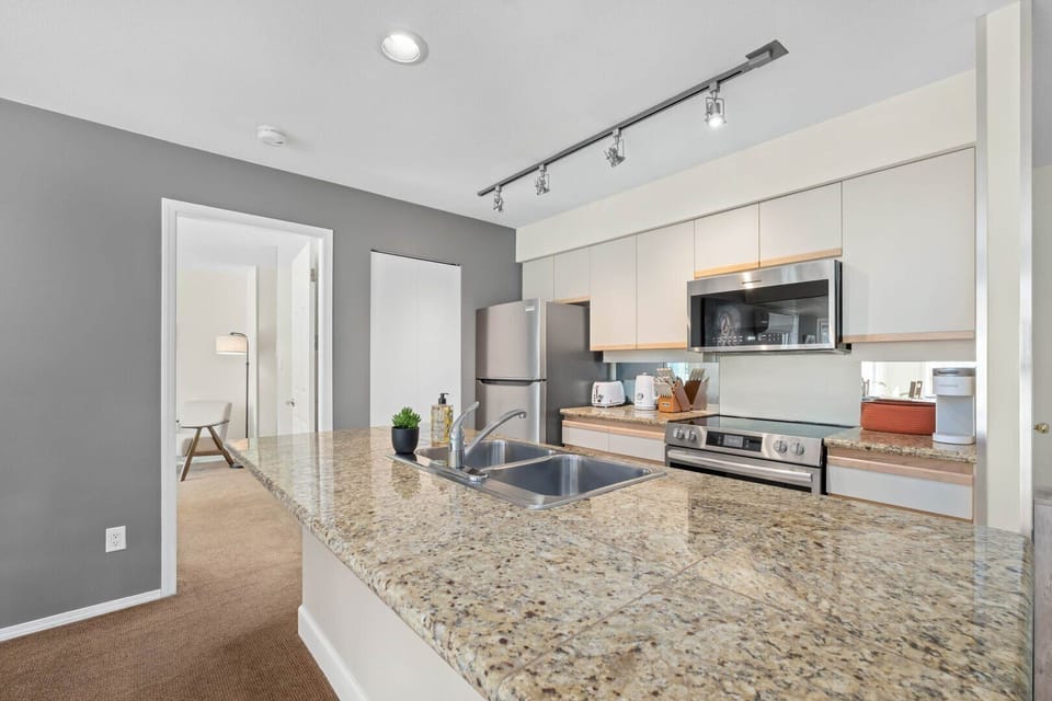 Fully equipped kitchen with brand-new appliances — everything you need for home-style cooking.