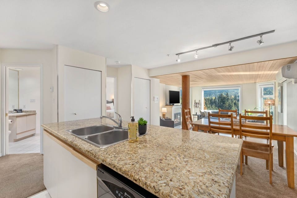 Convenience meets mountain charm in this well-stocked kitchen.