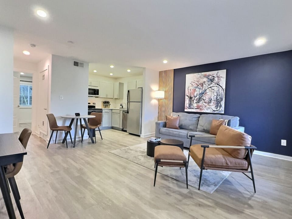 Step into a beautifully crafted furnished apartment featuring a stylish living room that perfectly blends comfort with contemporary design.