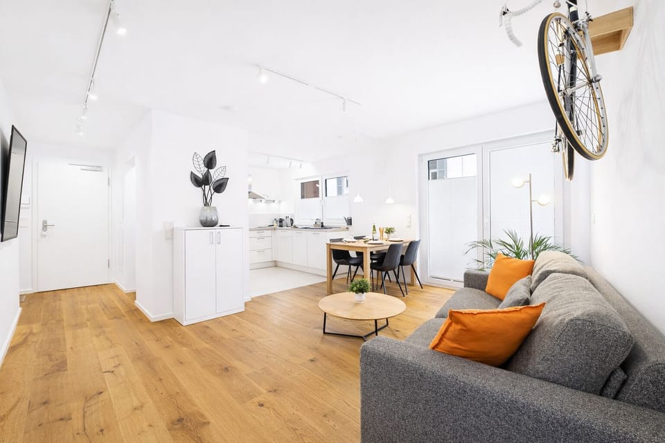 Open-plan living and dining area with a modern kitchen.