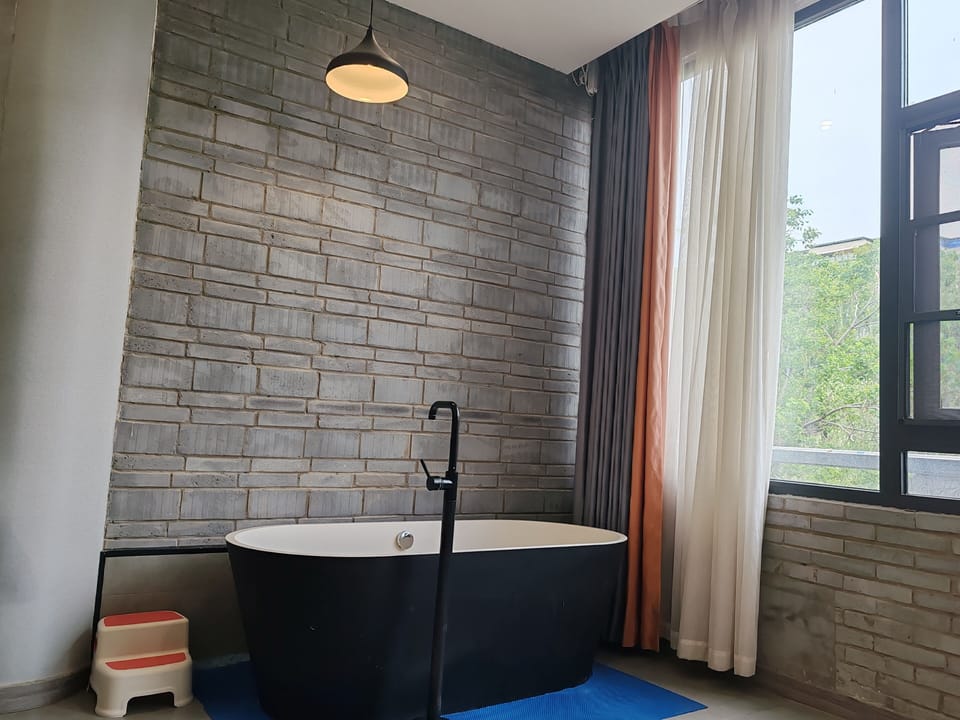 Family-friendly Twin Room | Blackout drapes, soundproofing, iron/ironing board (on request)