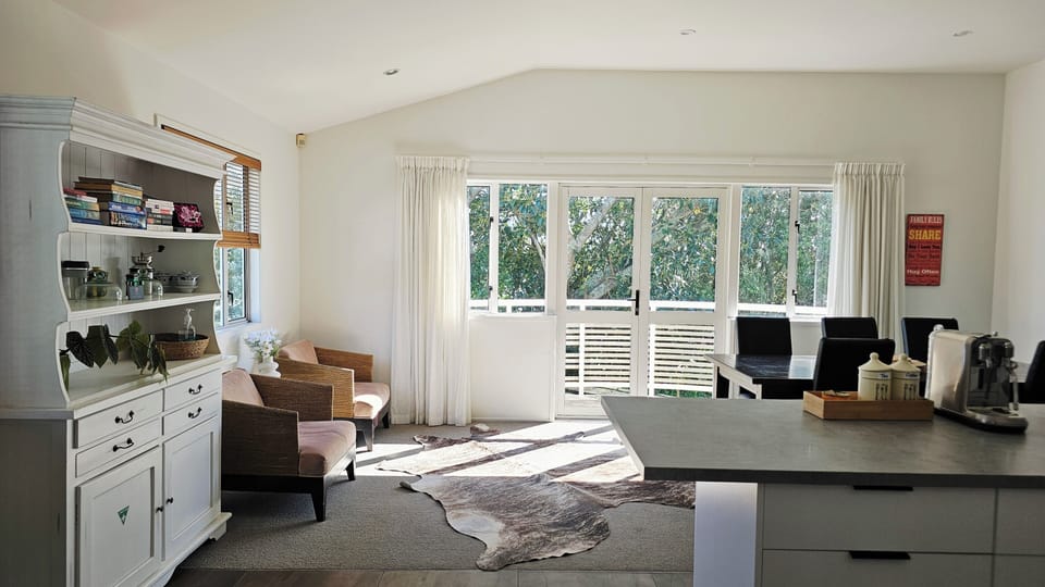 Signature Duplex, Patio, Garden View | Living area | Flat-screen TV