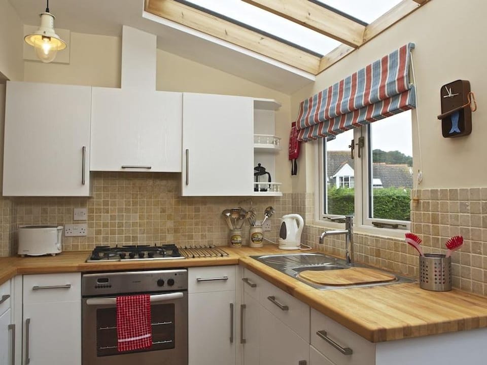 Fridge, microwave, cookware/dishes/utensils