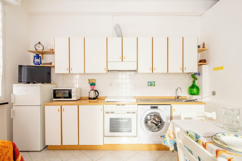 Apartment | Private kitchen | Fridge, microwave, stovetop, espresso maker