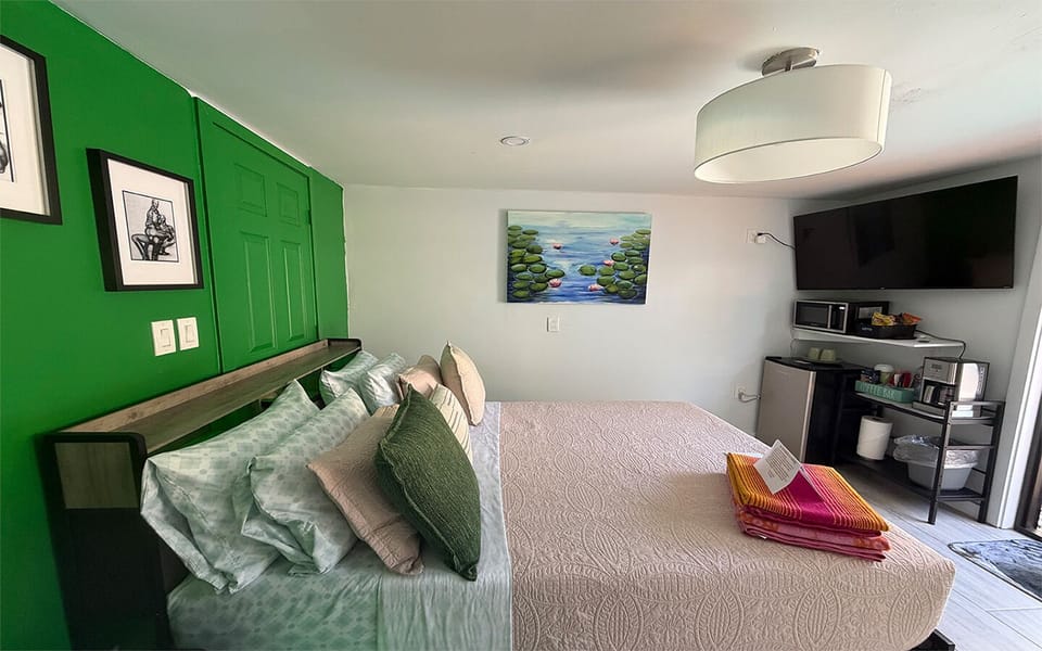 Queen bed, coffee station, and thoughtful amenities for your stay.