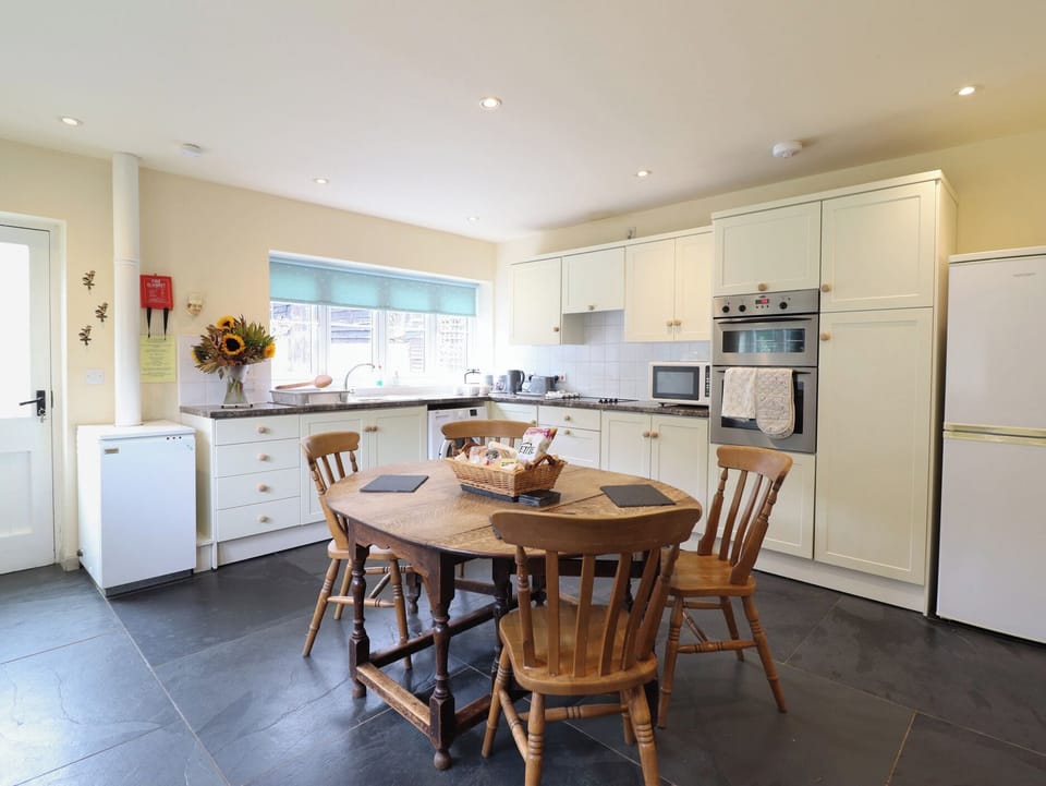 Fridge, microwave, toaster, cookware/dishes/utensils