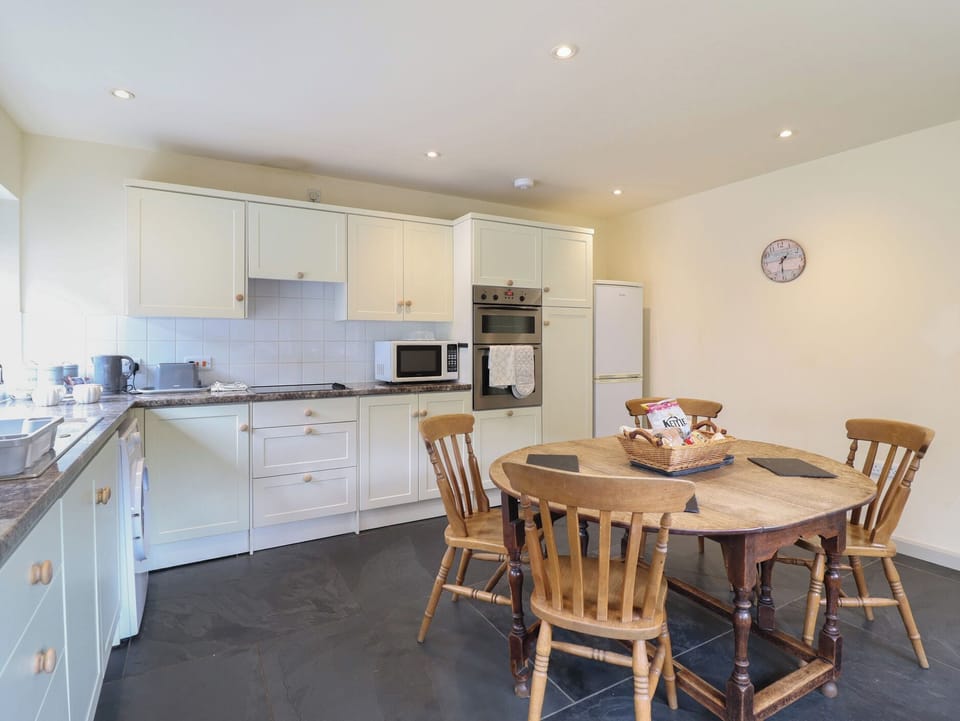 Fridge, microwave, toaster, cookware/dishes/utensils