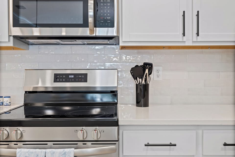 Kitchen with updated appliances and plenty of prep space