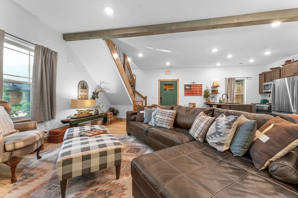 Living Area with Streaming Capable TV, Electric Fireplace, Plush Furnishings, Patio Access
