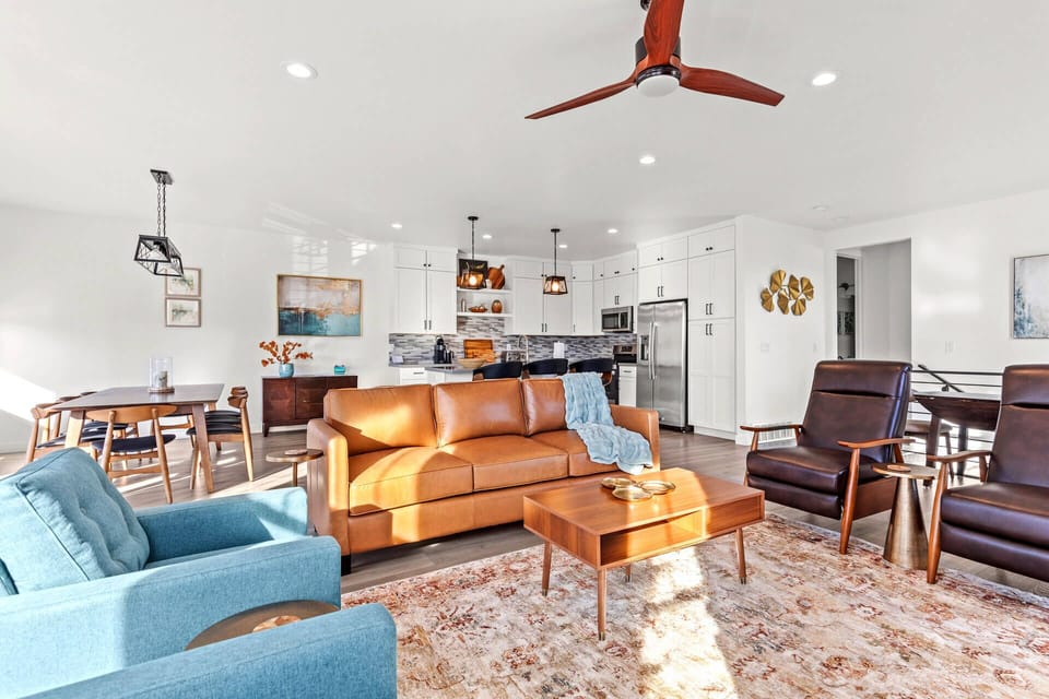 Jordanelle Ridge 499: Open and bright concept for gathering with plenty of seating for dining, movies, games and more.