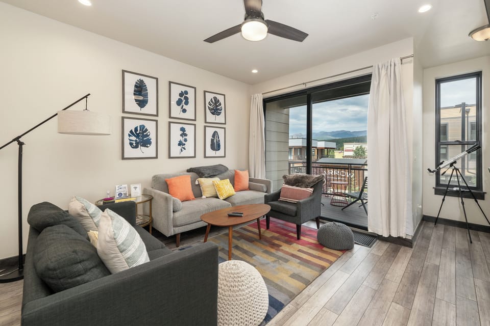 Unwind in your stylish living space with mountain views from your private balcony and modern comfort throughout.