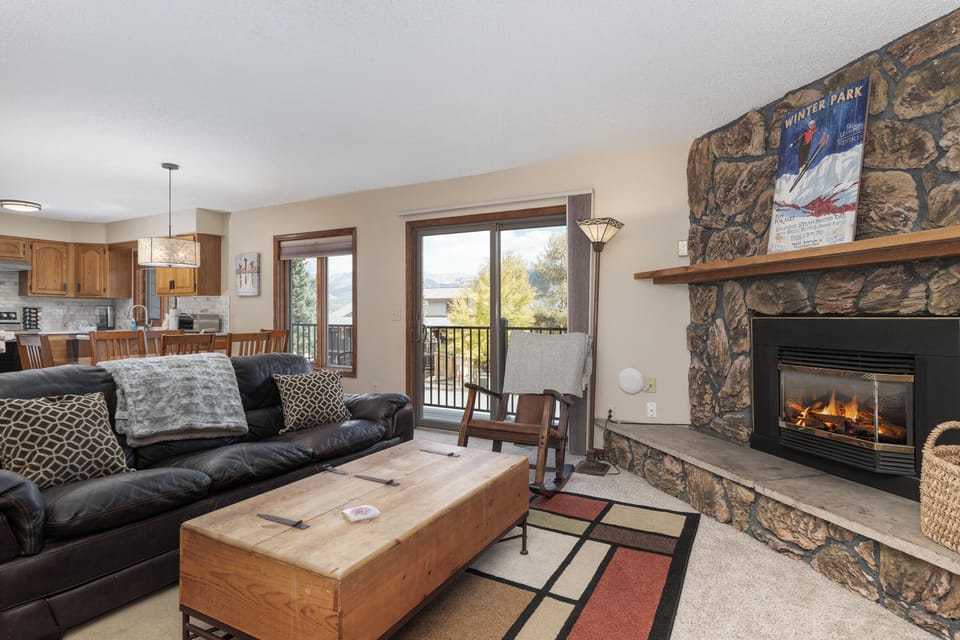 Cozy up by your crackling fireplace while mountain views fill the windows, creating the perfect après-ski retreat.