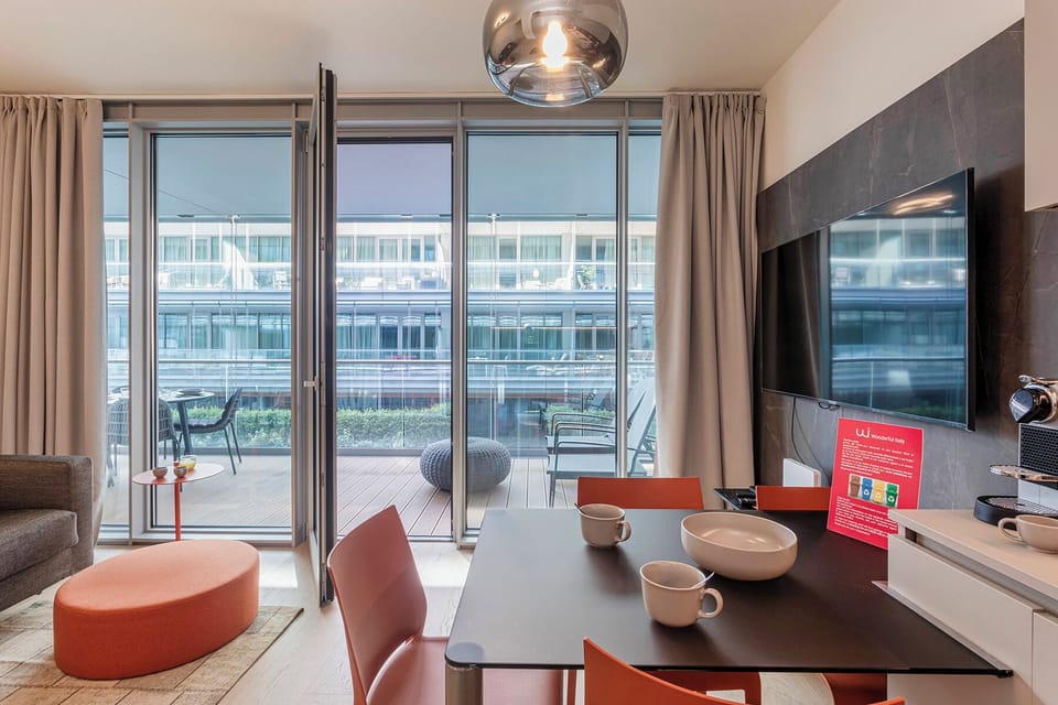Basic Apartment | Living area | 30-cm TV with satellite channels