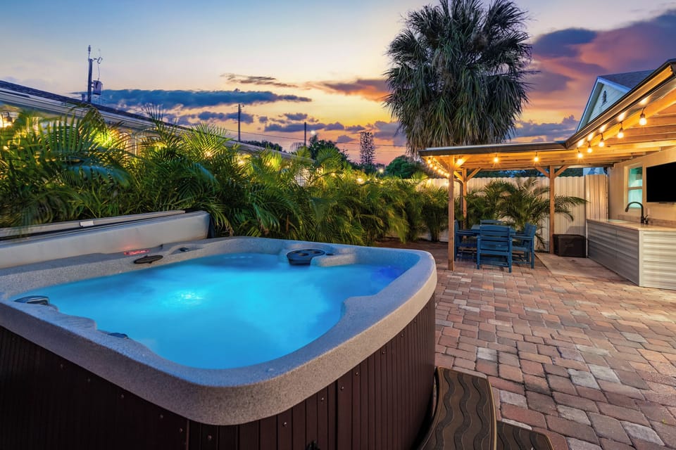 Evening magic awaits—soak in the warm bubbles under the glow of twilight skies.