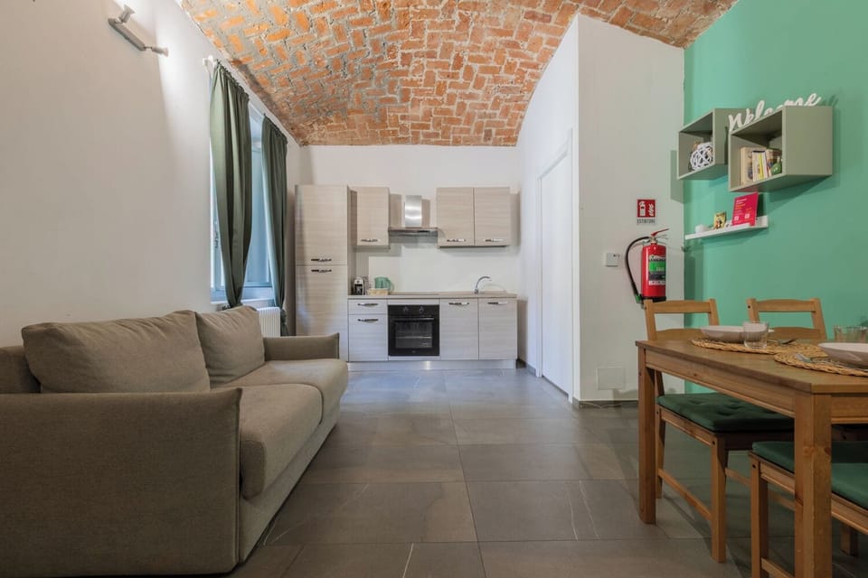 Apartment, 1 Bedroom | Living area | 30-inch TV with satellite channels