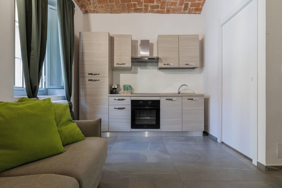 Apartment, 1 Bedroom | Living area | 30-inch TV with satellite channels