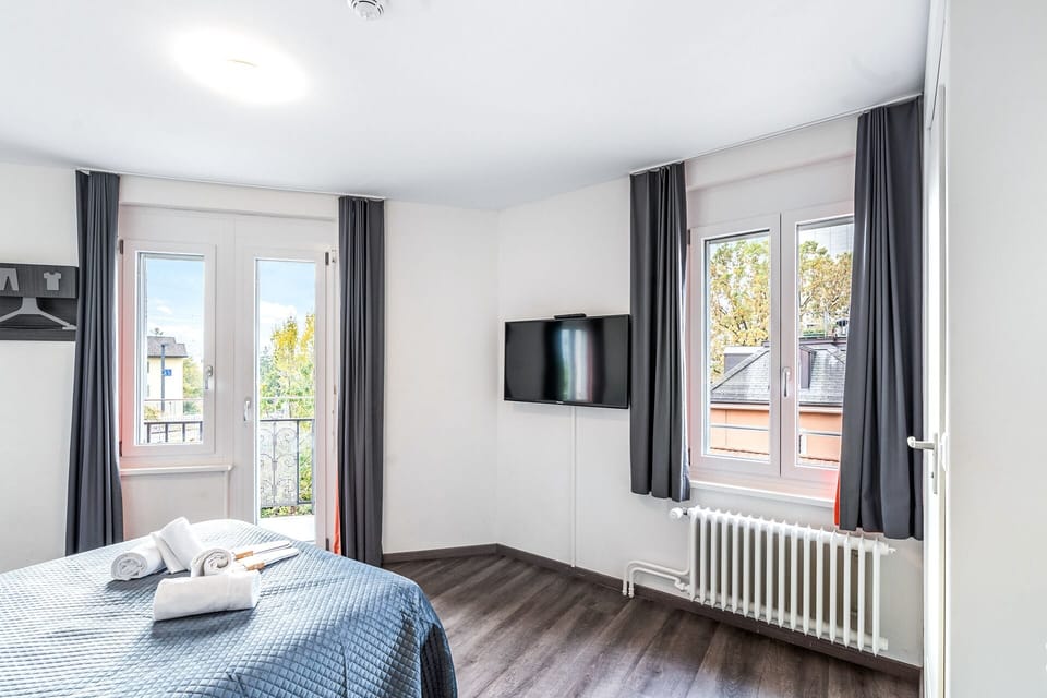 Family Triple Room, City View | Free WiFi, bed sheets