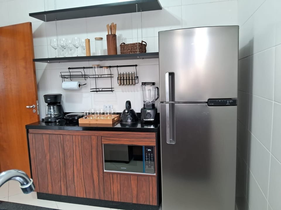 Basic Apartment | Private kitchen | Microwave, oven, stovetop, cookware/dishes/utensils