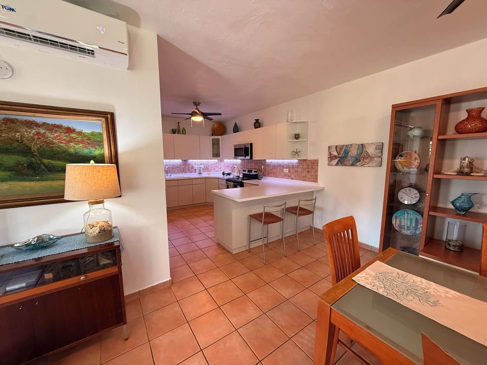 Kitchen and dining area. Table for 6 people plus sitting area in the kitchen