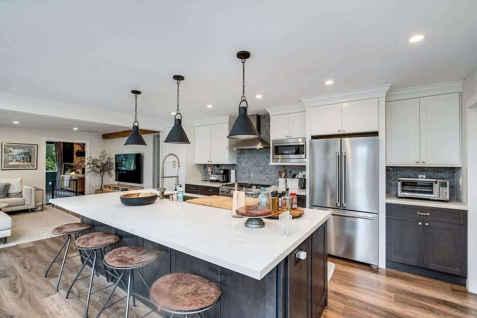 Spacious kitchen with modern appliances and cozy seating