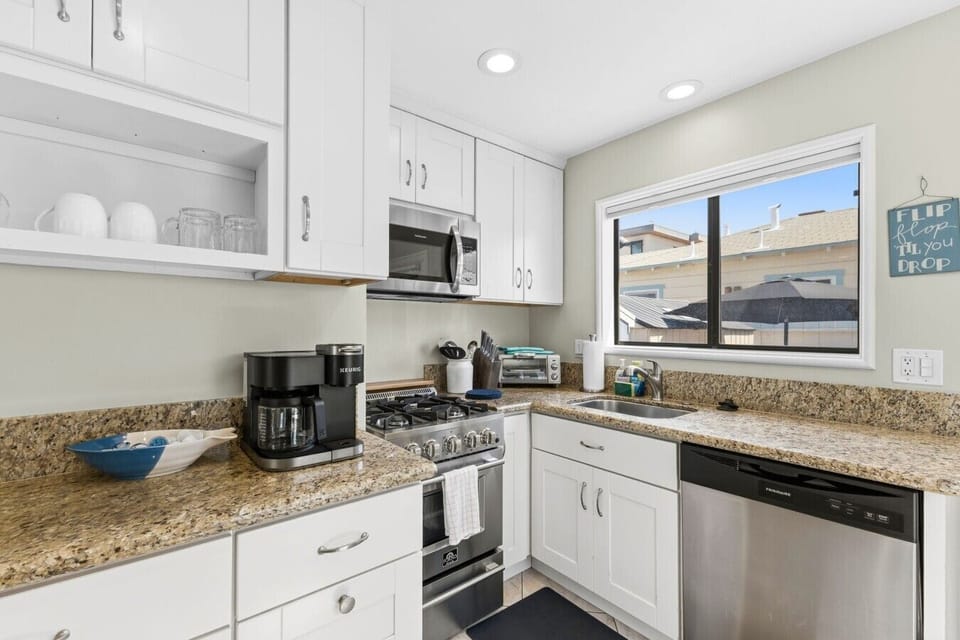 37-web-or-mls-812 Aspin Ct-33Fully equipped kitchen with updated appliances, ample counter space, and a drip coffee maker—perfect for cooking and morning brews
