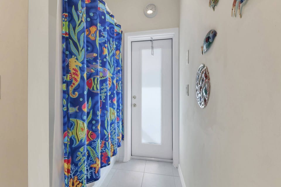 Direct access to the pool and lanai through the exterior bathroom door.