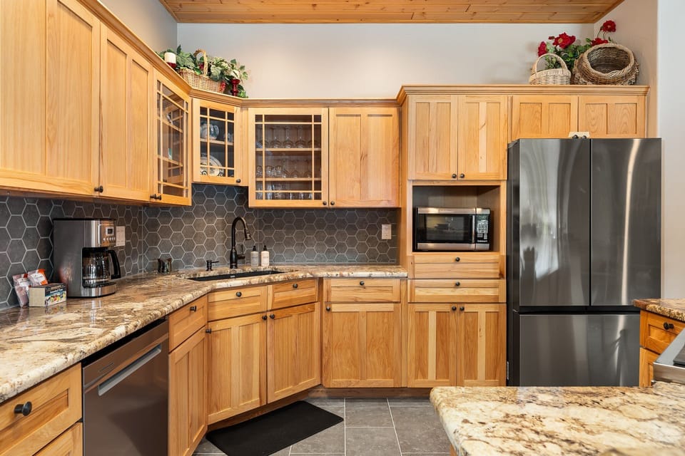 Fully Stocked Kitchen with Stainless Steel Appliances