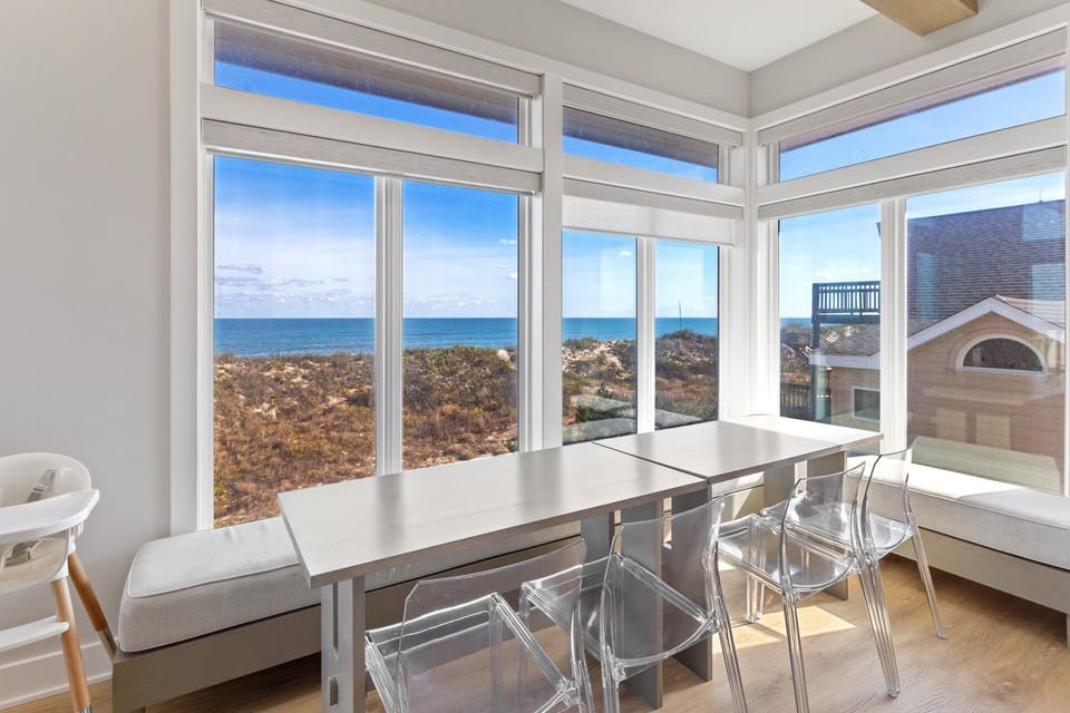 Gather around the dining table for ten or the breakfast nook for casual coastal meals with a view.