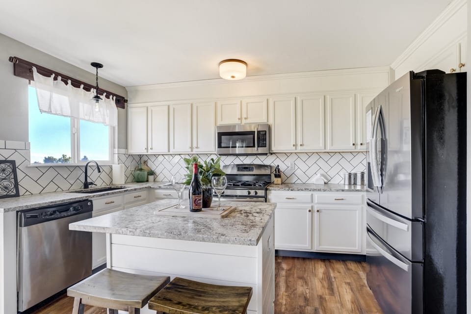 Featuring sleek stainless steel appliances and plenty of counter space to whip up your favorite meals.