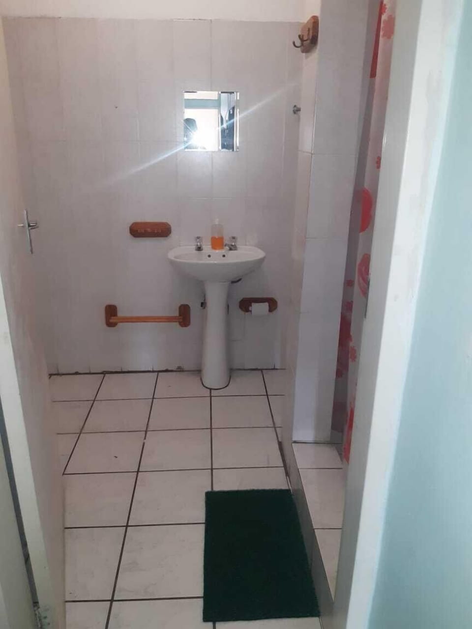 Shower, towels, soap, toilet paper